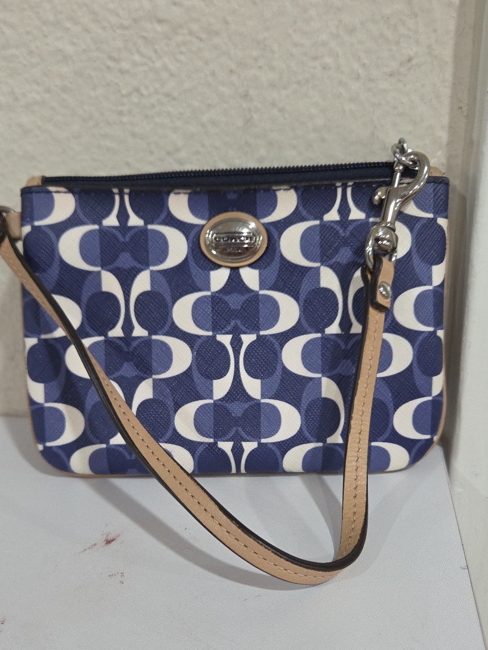 Coach Navy and White Signature Pattern Wristlet with Tan Strap